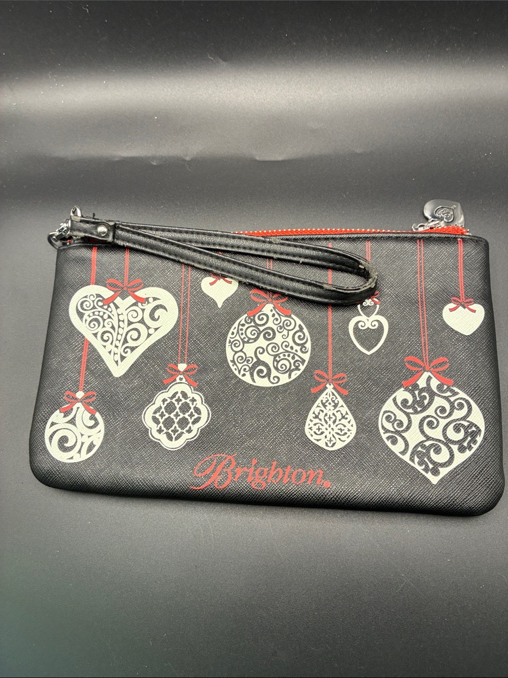 Brighton Black Wristlet Clutch with Red and Cream Ornament Print